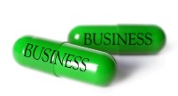 Graphic of a pill capsule that says business on the side