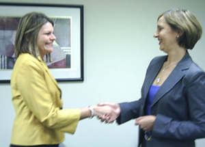 Janet Fiore congratulates Vickie Peirano Thompson